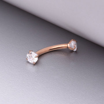 Detail View 1 of Implant Grade Titanium Rose Gold Prong Set Gem Sparkles Internally Threaded Curved Barbell-Clear Gem